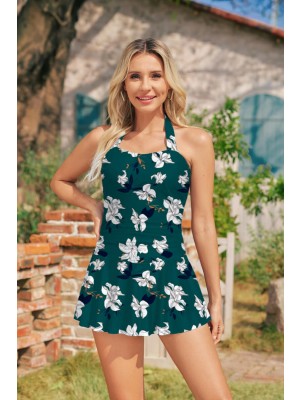 Grünes Badeanzugkleid mit Blumenmuster und Neckholder im tropischen Resort-Stil