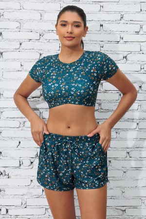 Blaues, geblümtes Bikinioberteil mit Ärmeln und Shorts für Jungen mit hoher Taille